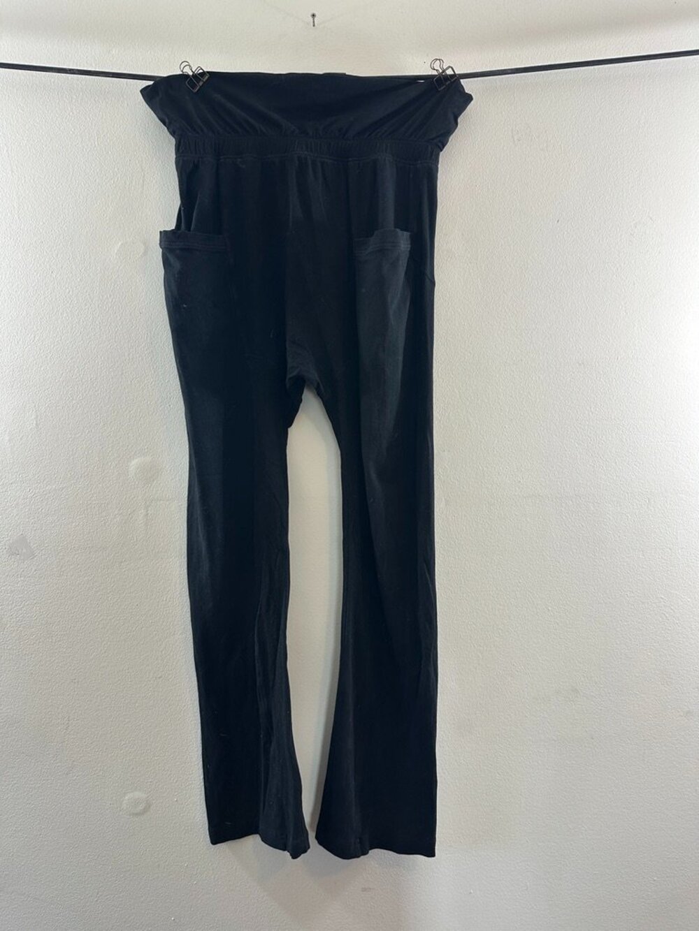 AryaSense black pants with slightly low crotch. They are a size large.